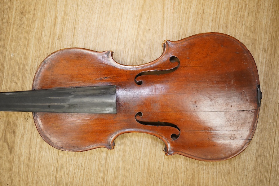 A late 19th century German violin, back measures 36cm. Condition - poor to fair